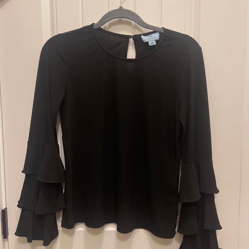 Black blouse with ruffled sleeves